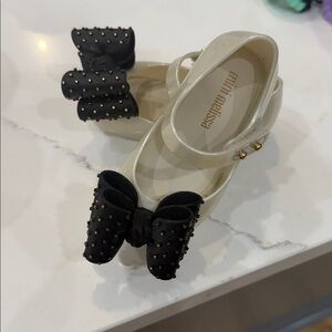 Mini Melissa Cream Jelly Mary Janes with Black Bow Accents